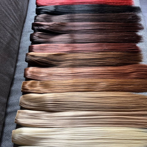 Hair extension on weft new, 60 cm length, 25 cm width, 100 g