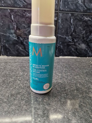 Morrocan oil mousse for very curly hair used