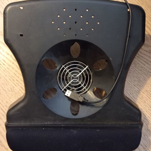 Laptop cooling stand used with fan