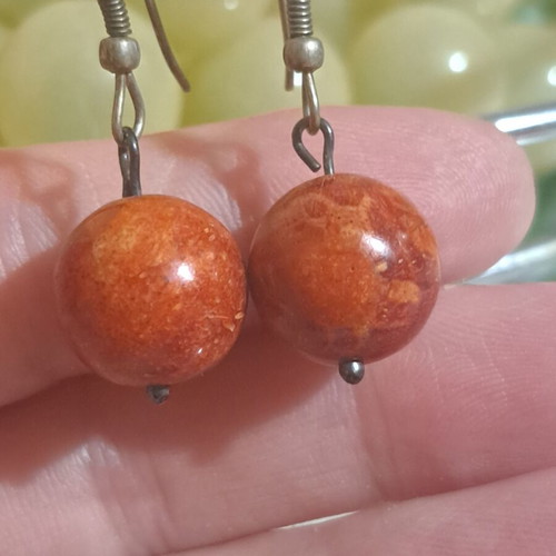 Earrings with silver metallic elements and brown round beads like new