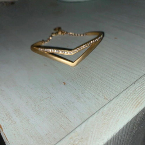 Bracelet made of steel and zircon stones, new, gold color