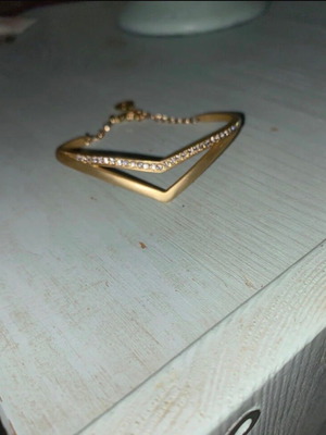 Bracelet made of steel and zircon stones, new, gold color