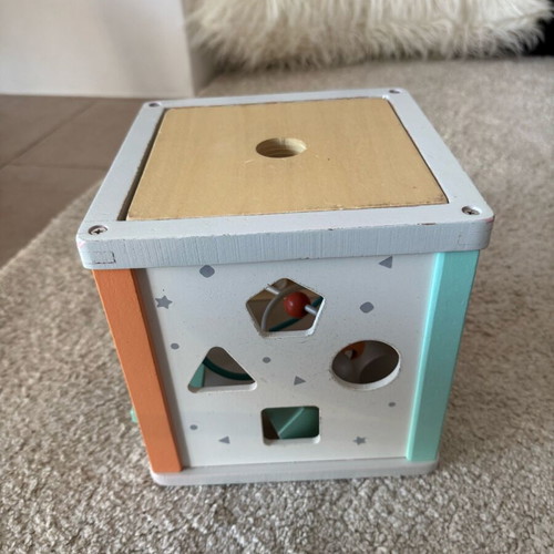 Gerardo's wooden activity cube used