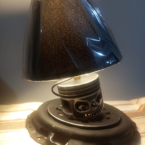 Handmade desk lamp with piston and clutch plate in deep black mat