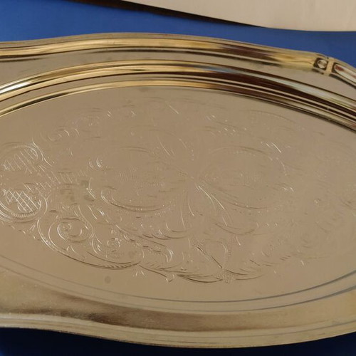 Silver-plated serving platter with embossed design, like new