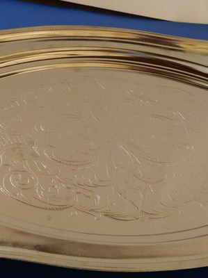 Silver-plated serving platter with embossed design, like new