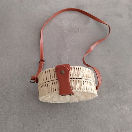 Straw bag round like new with brown strap
