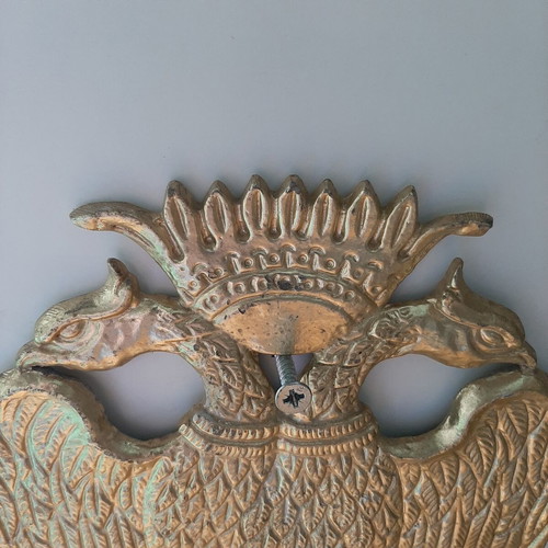 Metallic double-headed eagle coat of arms like new from old church