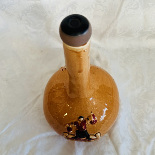 Vintage collectible 1965 glazed ceramic wine bottle used