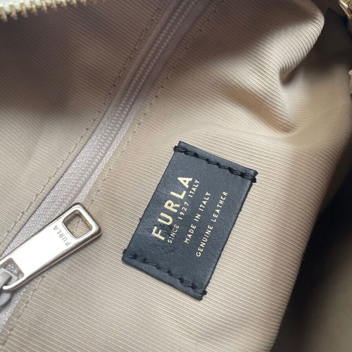 Furla backpack used, beige with front accessory option