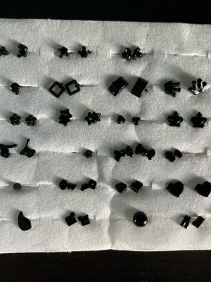 Black earrings new, set with missing pieces