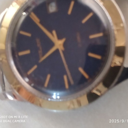 Poljot mechanical wristwatch like new, blue dial, gold bezel