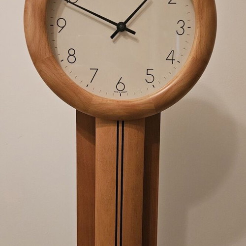 Hermle wall clock with pendulum like new, solid wood