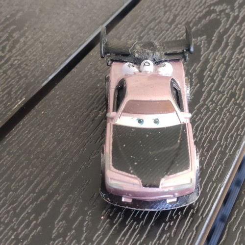 Disney Cars Boost 1:55 scale used with glued spoiler and bent wheels