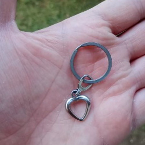 Metal heart keychain used, silver color