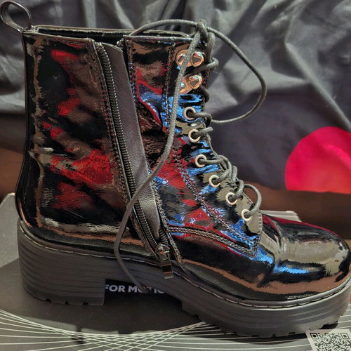 Women’s black patent leather boots like new with thick sole