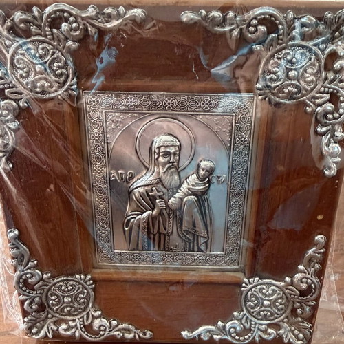 Icon of Saint Stylianos in wooden frame with metal decorations like new