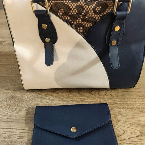 Color-block blue/white handbag used with animal print and detachable strap