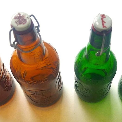 Vintage collectible beer bottles used, 4 pieces with porcelain caps