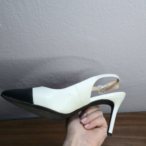 Francescomilano leather slingback pumps size 39 like new, black and white