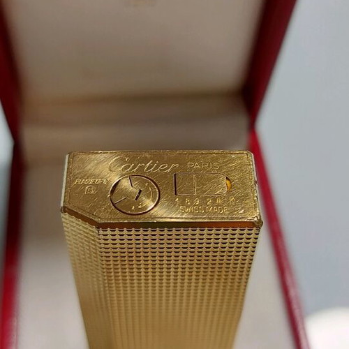 Cartier mod pentagon lighter used with heart box