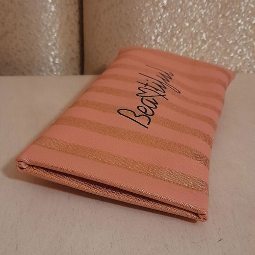 Beautiful glasses case new, pink with gold stripes
