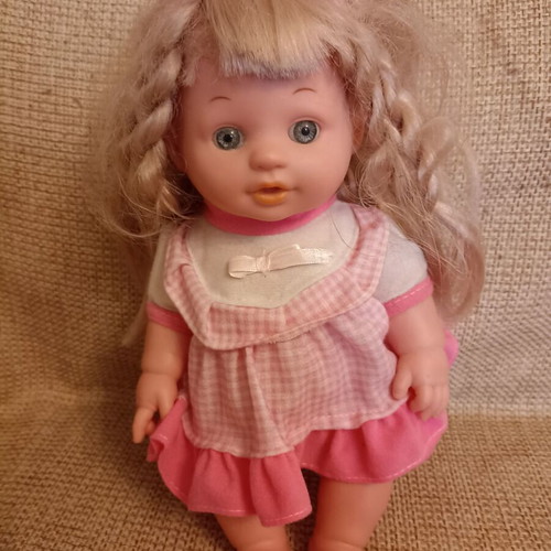 Doll with long hair like new