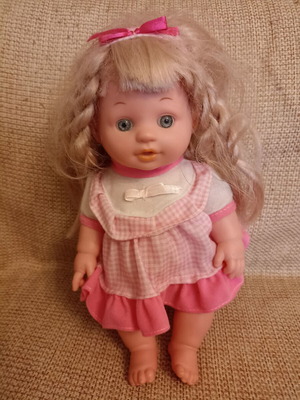 Doll with long hair like new
