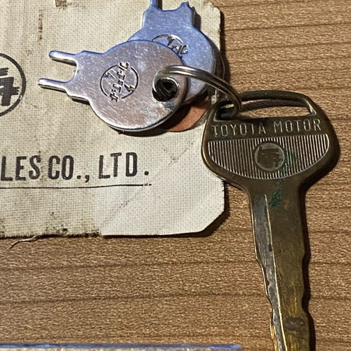 Collectible Toyota box with engine key and Corolla 1973 antenna like new