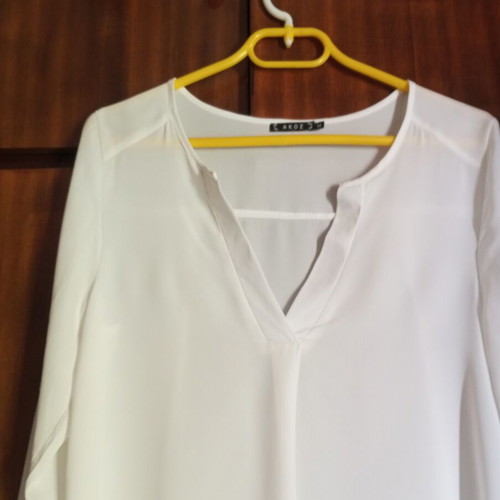 White airy long shirt with V neckline