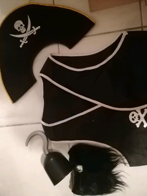 Pirate carnival costume used with bolero, hat, beard, and hook