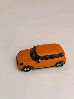 Toy car used, orange plastic, 4 cm miniature