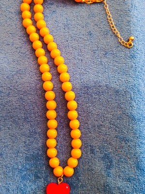 Boho summer necklace with orange beads and red heart new