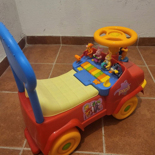 Winnie the Pooh ride-on car with sounds and storage