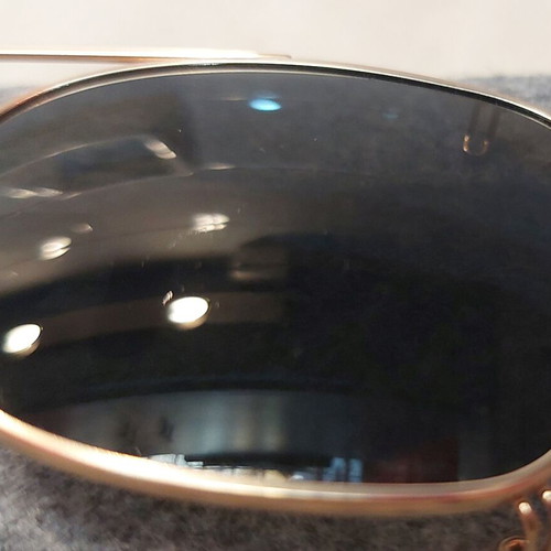 Clip On Sunglasses like new, gold color, no name