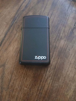 Zippo Classic Black Matte lighter used with red outline small size