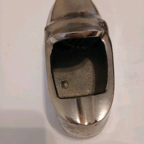 Metal ashtray in shoe shape like new