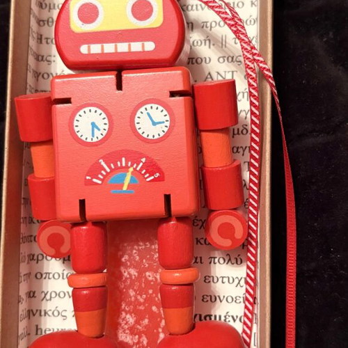 Easter candle with wooden robot figure new