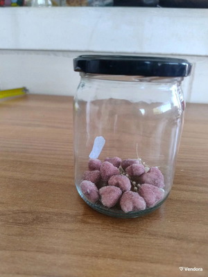Glass storage jar with decorative stones like new