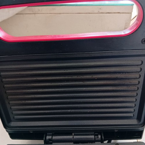 Izzy Milano EL-225A sandwich maker used with plate wear