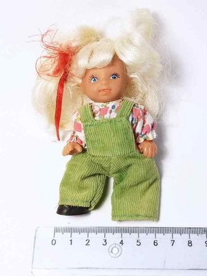 Plastic doll used, missing one leg