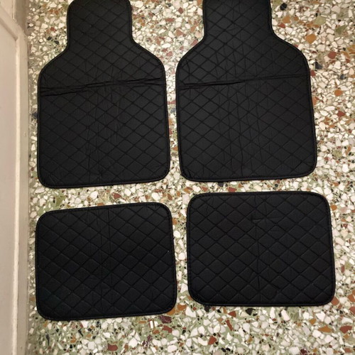 Car floor mats set of 4 like new, black quilted design