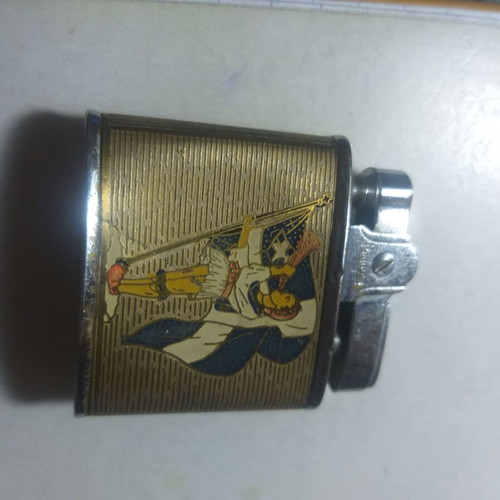 Penguin petrol lighter used, collectible