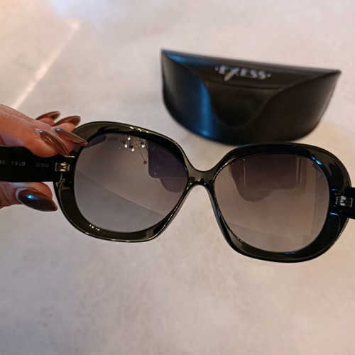 Exess sunglasses used with black acetate frame and gradient lens