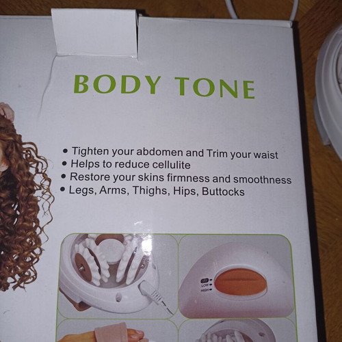 Body Tone massage machine like new with charger and cable