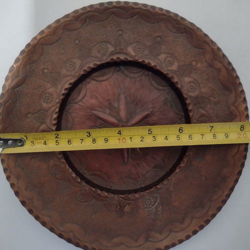 Copper Greek handmade carved wall plates used, all together
