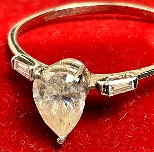 1.01 ct Diamond  Natural , earth mined Pear cut with Baguette on site 0,18 ct , stamped & papers