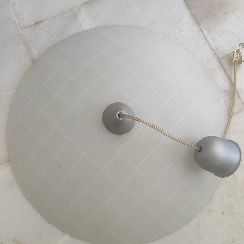Modern ceiling light with white glass shade used