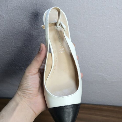 Francescomilano leather slingback pumps size 39 like new, black and white