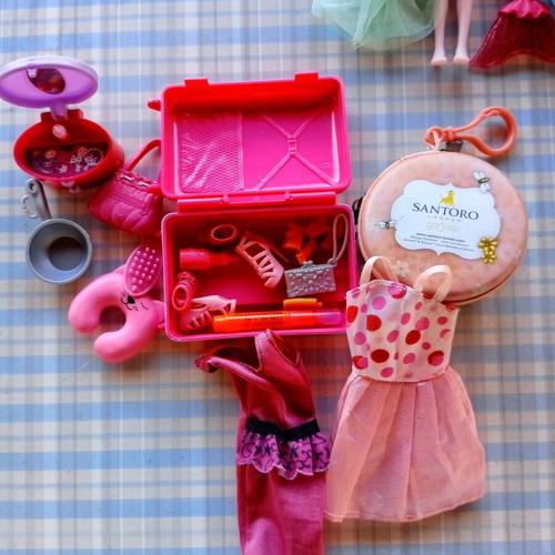 Various dolls with accessories